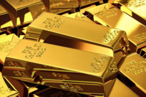 الذهب يتراجع 0.3% والأوقية تسجل 1870.69دولار